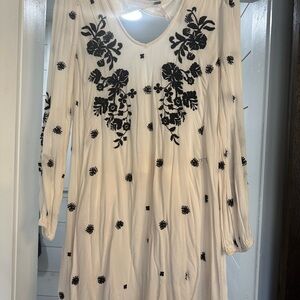 Elegant White Dress with Black Floral Embroidery